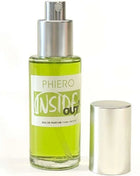 Ein schlanker transparenter glasflakon mit silberner sprühkappe enthält grünes phiero inside out parfum für männer