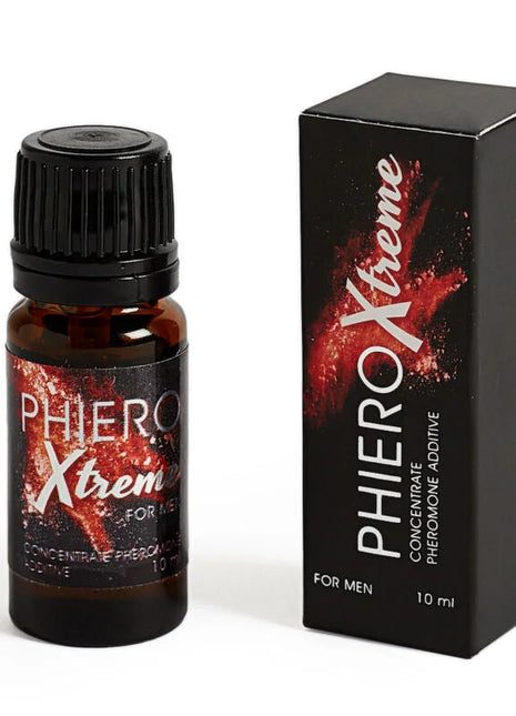 Schwarze glasflasche mit schwarzem geriffeltemverschluss und rotem spritzdesign phiero xtreme pheromonkonzentrat für männer