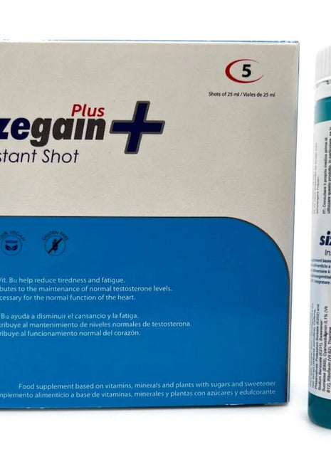 Eine blaugrüne und weiße sizegain plus instant shot flasche neben der verpackung 500 cosmetics männliches energieprodukt