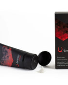 Black and red 500 cosmetics u-breast brustvergrößerungscreme tube with geometric design and matching box