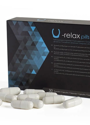 Schwarze und blaue box mit geometrischem muster der u-relax kapseln zur entspannung und angstreduzierung mit weißen kapseln davor