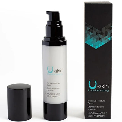 U-skin xtramoisturizing healing cream in a weiße flasche mit schwarzem pumpverschluss und schwarzer box mit türkisfarbenen akzenten