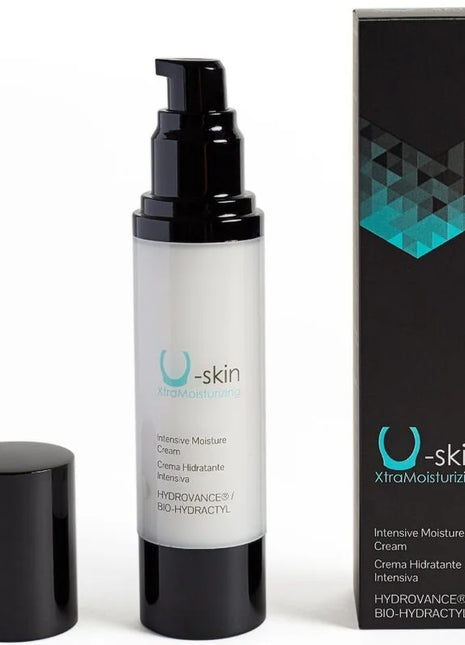 U-skin xtramoisturizing healing cream in a weiße flasche mit schwarzem pumpverschluss und schwarzer box mit türkisfarbenen akzenten