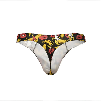 Schwarzer string anais men banana mit mutigem muster aus roten lippen und gelben bananen und weißem innenfutter