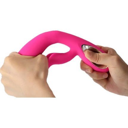 Fuchsienfarbiger harmony daro vibrator und pull ring stimulator aus silikon mit metallic-knopf am griff