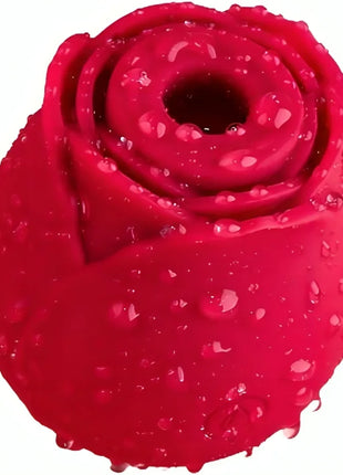 Vibrant roter silikonvibrator in rosenform mit wassertröpfchen für den ariony delight blume roter sauger