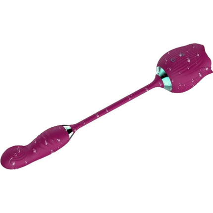 Fuchsiafarbener silikon vibrator in rosenform mit strukturierter oberfläche und türkisfarbenen akzenten von armony