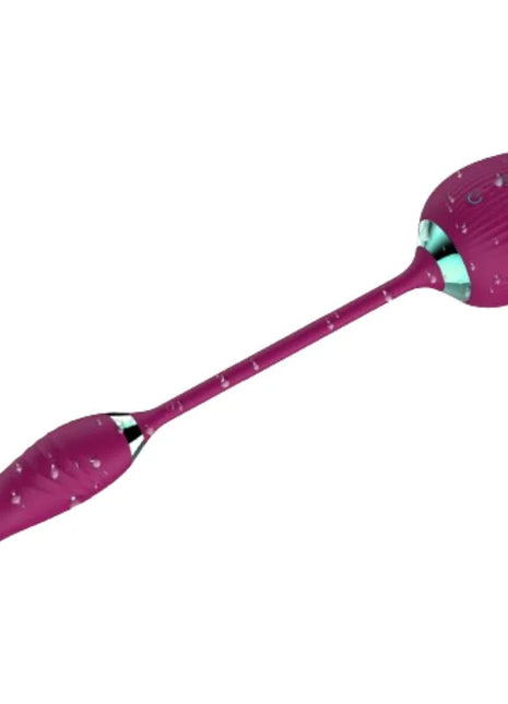 Fuchsiafarbener silikon vibrator in rosenform mit strukturierter oberfläche und türkisfarbenen akzenten von armony