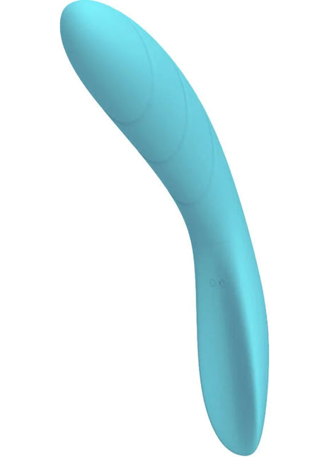 Ein leichter blauer silikonvibrator mit glattem, gebogenem design und dezenten strukturierten rillen von Armony Elizabeth Blauer