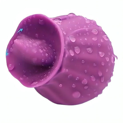 Armony fig-vibrator mit zunge aus lila silikon mit strukturierter oberfläche und wassertröpfchen