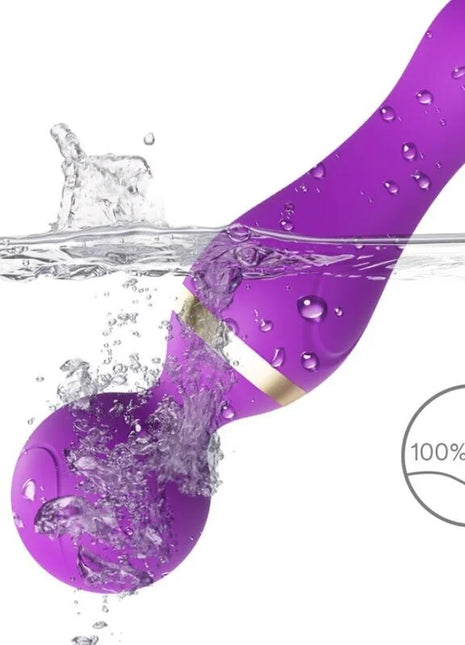 Armony freeza massager und vibrator lila silikon mit goldfarbener bandteil teilweise im wasser getaucht