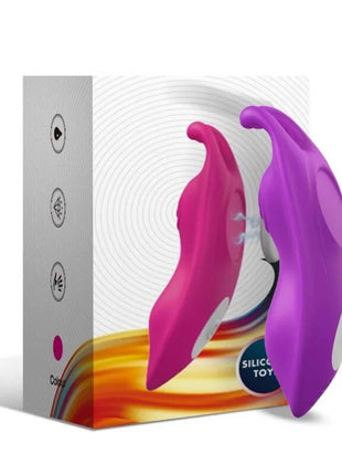 Lila und pinke silikon vibrator mit weißen kreistasten neben der verpackung des harmony honeybee tragbares höschens G-spot mit fernbedienung