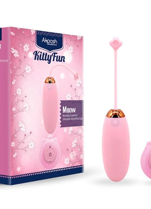 Rosafarbener silikon vibrator egg mit goldfarbener spitze und passender katzenförmiger fernbedienung armoNY