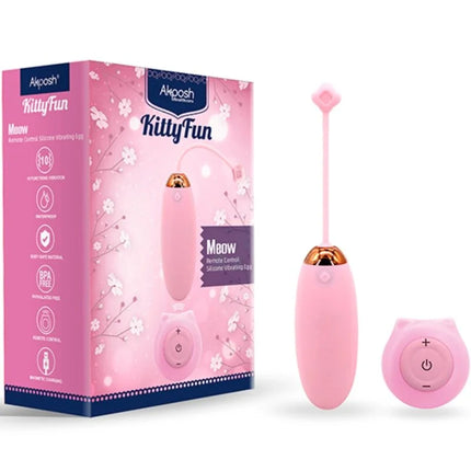 Rosafarbener silikon vibrator egg mit goldfarbener spitze und passender katzenförmiger fernbedienung armoNY