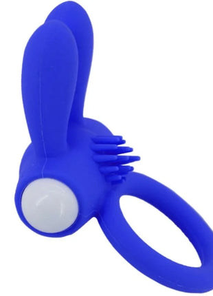 Armony mr bunny vibratorring silikon blau mit weißem knopfdruck und borstenstruktur auf der rückseite