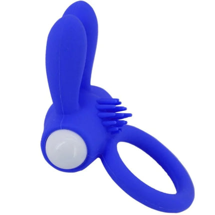 Armony mr bunny vibratorring silikon blau mit weißem knopfdruck und borstenstruktur auf der rückseite