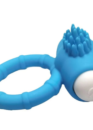 Blauer silikonring mit strukturierter stacheliger kopf und weißem kugelknopf armony power o vibraterring grün