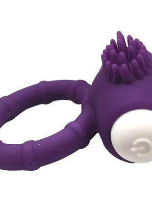 Armony power o vibratorring aus lila silikon mit strukturierter bürstenkopf und weißem seitlichem knopf