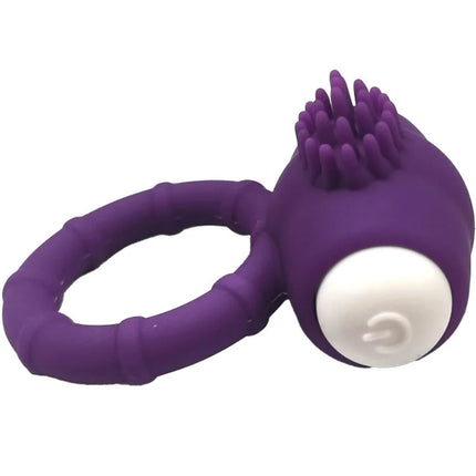Armony power o vibratorring aus lila silikon mit strukturierter bürstenkopf und weißem seitlichem knopf