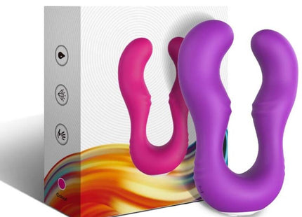 Vibrant pink und lila silikon dual-ended vibrator mit zwei fernbedienungen neben farbenfroher verpackung