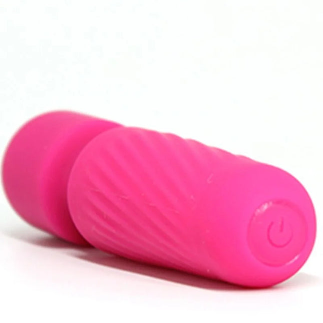 Hellrosa silikon vibrator mit geriffelter struktur und einschaltknopf ariony magic massager rosa
