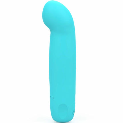 Ein eleganter, türkisfarbener bcute curve infinite classic silikon-vibrator von b swish mit geschwungener form