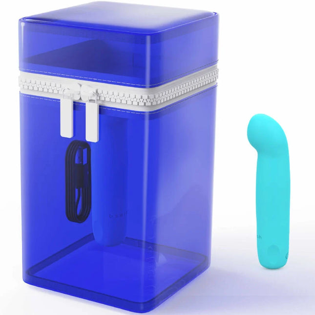 Blauer silikon-vibrator bcute curve infinite mit weißem reißverschluss in blauem durchscheinendem plastikbox und teal spielzeug