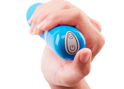Blauer b swish bdesired deluxe curve handvibrator aus kunststoff mit power- und modustasten auf silberner ovaler folie