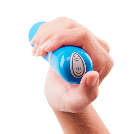 Blauer b swish bdesired deluxe curve handvibrator aus kunststoff mit power- und modustasten auf silberner ovaler folie