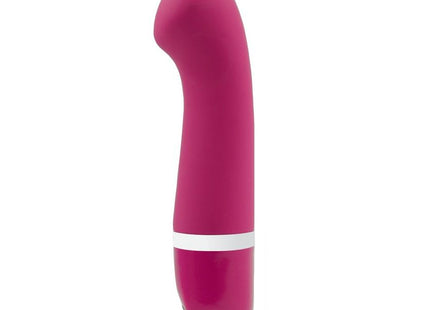 Ein schlanker magentafarbener silikonvibrator mit glattem gebogenem design und weißem akzentband b swish bdesired deluxe curve rosa
