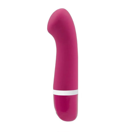 Ein schlanker magentafarbener silikonvibrator mit glattem gebogenem design und weißem akzentband b swish bdesired deluxe curve rosa