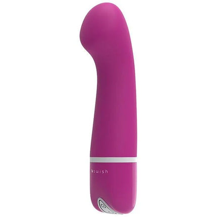 Ein elegantes magentafarbenes Erwachsenen-Spielzeug b swish bdesired deluxe curve rosa mit glatter gebogener form und weißem band nahe der basis