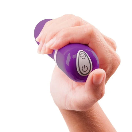 Purple silikon-vibrationsspielzeug b swish bdesired deluxe pearl royal flieder mit glatter glänzender oberfläche und silbernen steuerknöpfen