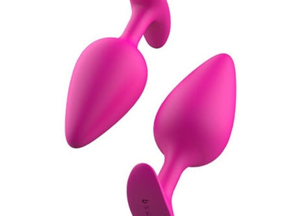 Vibrante pinke silikon prostata plug mit glattem design und herzförmiger basis von B swish basic plus magenta