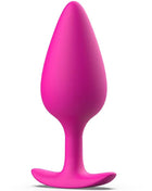 Ein lebhaft pinker, glatter silikon-prostatastöpsel mit konischem design und stabilem grund, b swish bfille basic plus magenta