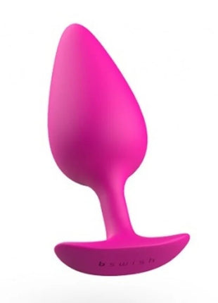 Ein lebhaft pinker silikon-prostatastöpsel bawdy mit glatter oberfläche und gebogenem sockel in magenta