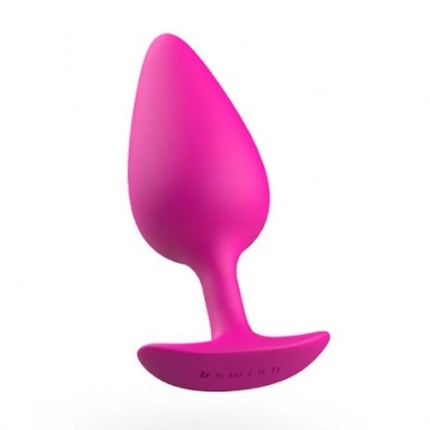 Ein lebhaft pinker silikon-prostatastöpsel bawdy mit glatter oberfläche und gebogenem sockel in magenta
