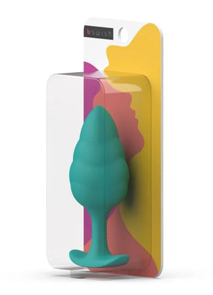 Teal silikon bswish butt plug in klarer verpackung mit buntem abstraktem design b swish bfille basic türkis