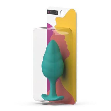 Teal silikon bswish butt plug in klarer verpackung mit buntem abstraktem design b swish bfille basic türkis