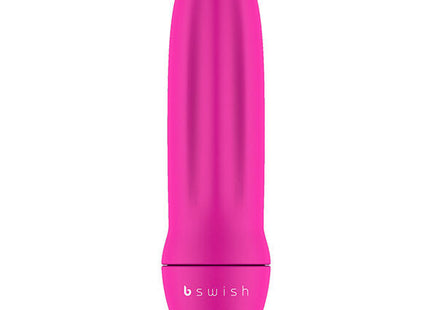 Ein schlankes, lebhaft pinkes bswish bmine classic personal pleasure device mit glatter, gerippter textur und abgerundeten konturen
