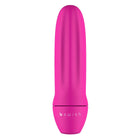 Ein schlankes, lebhaft pinkes bswish bmine classic personal pleasure device mit glatter, gerippter textur und abgerundeten konturen