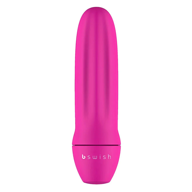 Ein schlankes, lebhaft pinkes bswish bmine classic personal pleasure device mit glatter, gerippter textur und abgerundeten konturen