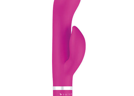 Ein lebhaft pinker b-swish bwild classic marine rabbit vibrator cerise mit glattem gebogenem design und silbernem akzentband