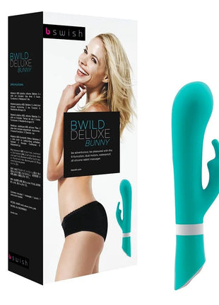 Teal silikon b wild deluxe bunny rabbit vibrator mit weißem band near dem sockel von b swish jade