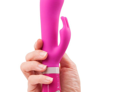 Belebter pinker bunny-vibrator aus silikon mit silbernem akzentband von b swish bwild deluxe raspberry