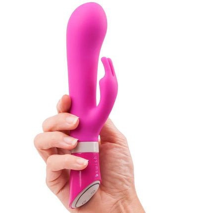 Belebter pinker bunny-vibrator aus silikon mit silbernem akzentband von b swish bwild deluxe raspberry