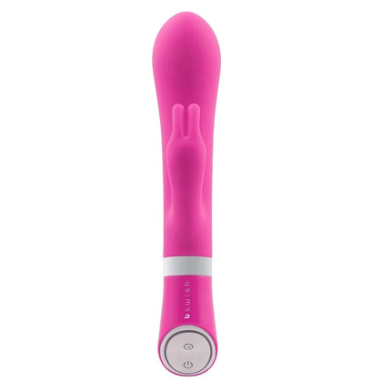 B swish bwild deluxe pink vibrierender hase mit glattem silikonkörper und silbernen steuerungstasten raspberry