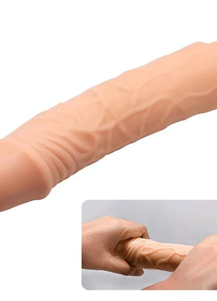 Beiger silikon dildo mit strukturierter oberfläche und geripptem griff baile barbara realistischer vibrator 20 cm