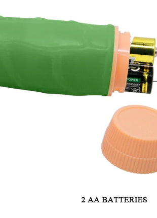 Grüner silikonüberzogener batteriebetriebener realistischer vibrator von baile mit zwei eingelegten aa-batterien und pfirsichfarbenem deckel