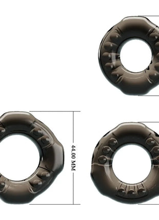 Dunkelbrauner transparenter silikon cock ring mit erhabenen punkten aus dem baile cock ringe yvonne set 3 penisringe